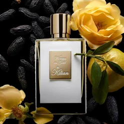 Woman in Gold Eau de Parfum Refillable Spray  mit Clutch